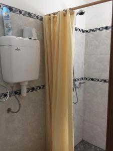 Phòng tắm tại Casa de descanso