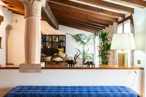 En eller flere senge i et værelse på Domus Verona - Magnifiche Residenze San Fermo