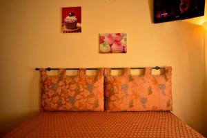 A bed or beds in a room at Agriturismo IL BORGHETTO