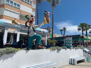 Hostia v ubytovaní Apartamento Turistico Peñalver Playa 316