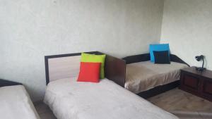 Un ou plusieurs lits dans un hébergement de l'établissement Retro apartment