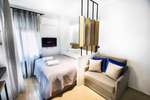 A bed or beds in a room at White Rhino White Tower