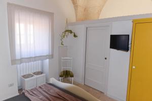 Postel nebo postele na pokoji v ubytování Casa Mida - Guest House