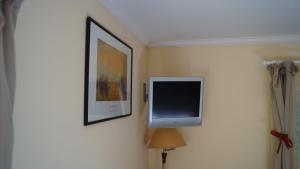TV a/nebo společenská místnost v ubytování Hotel Bastion