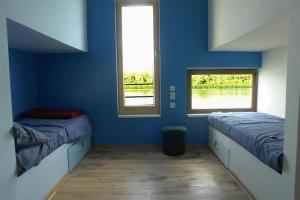 Vuode tai vuoteita majoituspaikassa ArkaBarka Floating Hostel