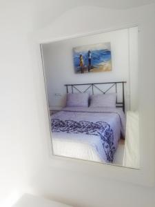 A bed or beds in a room at Benalmarina Sea View Apartments