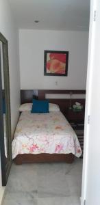Cama o camas de una habitación en Aqcua Condo Vallarta