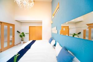 Voodi või voodid majutusasutuse Awaji Seaside Resort Kuruma52 toas