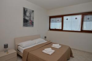 Katil atau katil-katil dalam bilik di ITALY-HOUSE Brigida 100 Termoli Molise +60 gambar