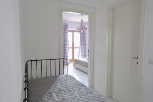 Postel nebo postele na pokoji v ubytování B&B POGGIO DEL SOLE