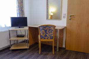 TV a/nebo společenská místnost v ubytování Hotel Restaurant Waldlust