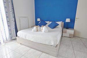Postel nebo postele na pokoji v ubytování B&B POGGIO DEL SOLE