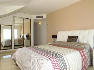 Postel nebo postele na pokoji v ubytování Torreon del Mar Penthouse Deluxe