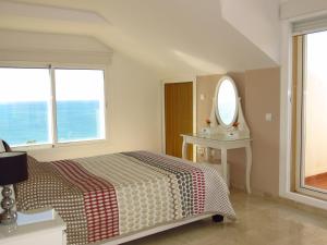 Posteľ alebo postele v izbe v ubytovaní Torreon del Mar Penthouse Deluxe