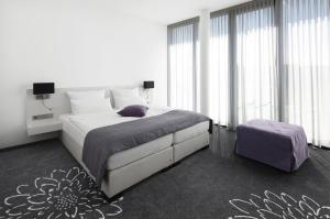 Postel nebo postele na pokoji v ubytování Hotel Otterbach + 37 fotografií