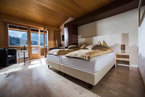 Letto o letti in una camera di Jungfrau Hotel