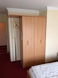 Postel nebo postele na pokoji v ubytování Hotel Pflieger