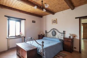 Postel nebo postele na pokoji v ubytování Casa Rancacci