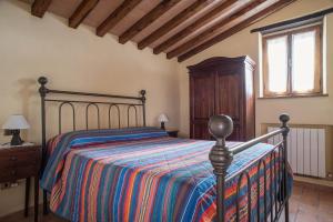 Postel nebo postele na pokoji v ubytování Casa Rancacci