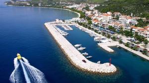 an aerial view of a harbor with boats in the water at House Villa Roza in Tučepi