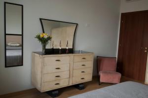 A bed or beds in a room at Le Cupoline