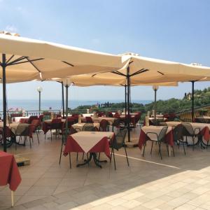 Un restaurante o sitio para comer en Affittacamere Battistoli