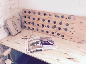 a book sitting on a table next to an abacus at Apartments San Ignacio de Loyola in Manresa