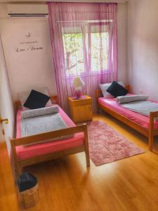 Postel nebo postele na pokoji v ubytování Rooms Deny