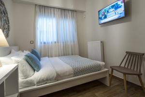 Postel nebo postele na pokoji v ubytování Lemar Luxury Apartments