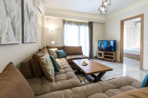 TV a/nebo společenská místnost v ubytování Lemar Luxury Apartments
