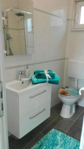 Kúpeľňa v ubytovaní Studio Apartman Vortex