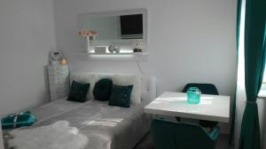Posteľ alebo postele v izbe v ubytovaní Studio Apartman Vortex