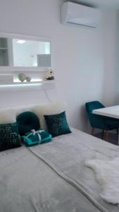 Posteľ alebo postele v izbe v ubytovaní Studio Apartman Vortex