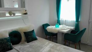 Posteľ alebo postele v izbe v ubytovaní Studio Apartman Vortex