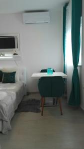 Posteľ alebo postele v izbe v ubytovaní Studio Apartman Vortex