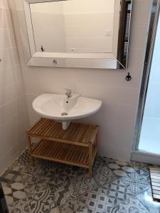 Koupelna v ubytování Apartments Bassi