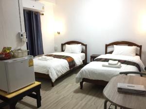 Postel nebo postele na pokoji v ubytování T&N home Ayutthaya