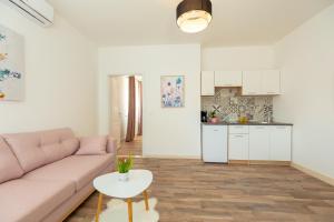 Kuchyň nebo kuchyňský kout v ubytování Holiday Apartments Dubrovnik