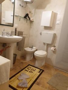 Ванна кімната в LA CASETTA DI AGNESE