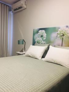 En eller flere senge i et værelse på Apartamento da Seara "Douro"