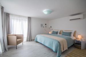 Posteľ alebo postele v izbe v ubytovaní Villa Mamma Mia Oprtalj