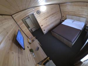 an overhead view of a bedroom in a tiny house at Вояж Луцьк in Lutsk