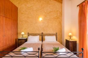 Postel nebo postele na pokoji v ubytování Villa Zeta
