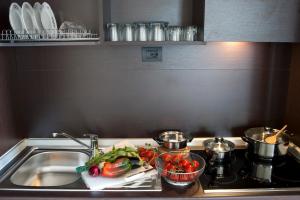 A kitchen or kitchenette at Le Cupoline