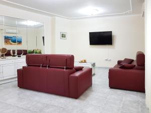 A television and/or entertainment centre at Casa Julia 2 gran piso vistas playa Las Teresitas 4 pax