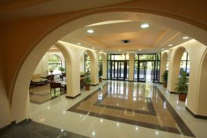 an empty lobby with an archway in a building at Best Resort Aghveran in Arzakan