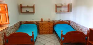 Posteľ alebo postele v izbe v ubytovaní Casa de desierto