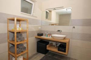 Koupelna v ubytování Apartma - Počitniška hiša Lodi