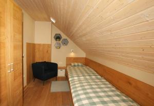 Postel nebo postele na pokoji v ubytování Apartma - Počitniška hiša Lodi