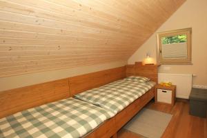 Postel nebo postele na pokoji v ubytování Apartma - Počitniška hiša Lodi